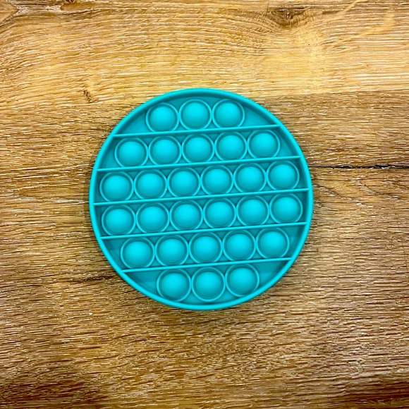 Teal circle poppit - Picture 1 of 1